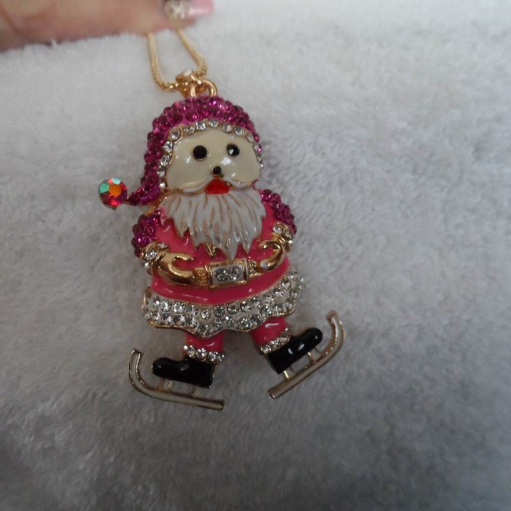 Pink and crystal Santa on skates necklace pendant